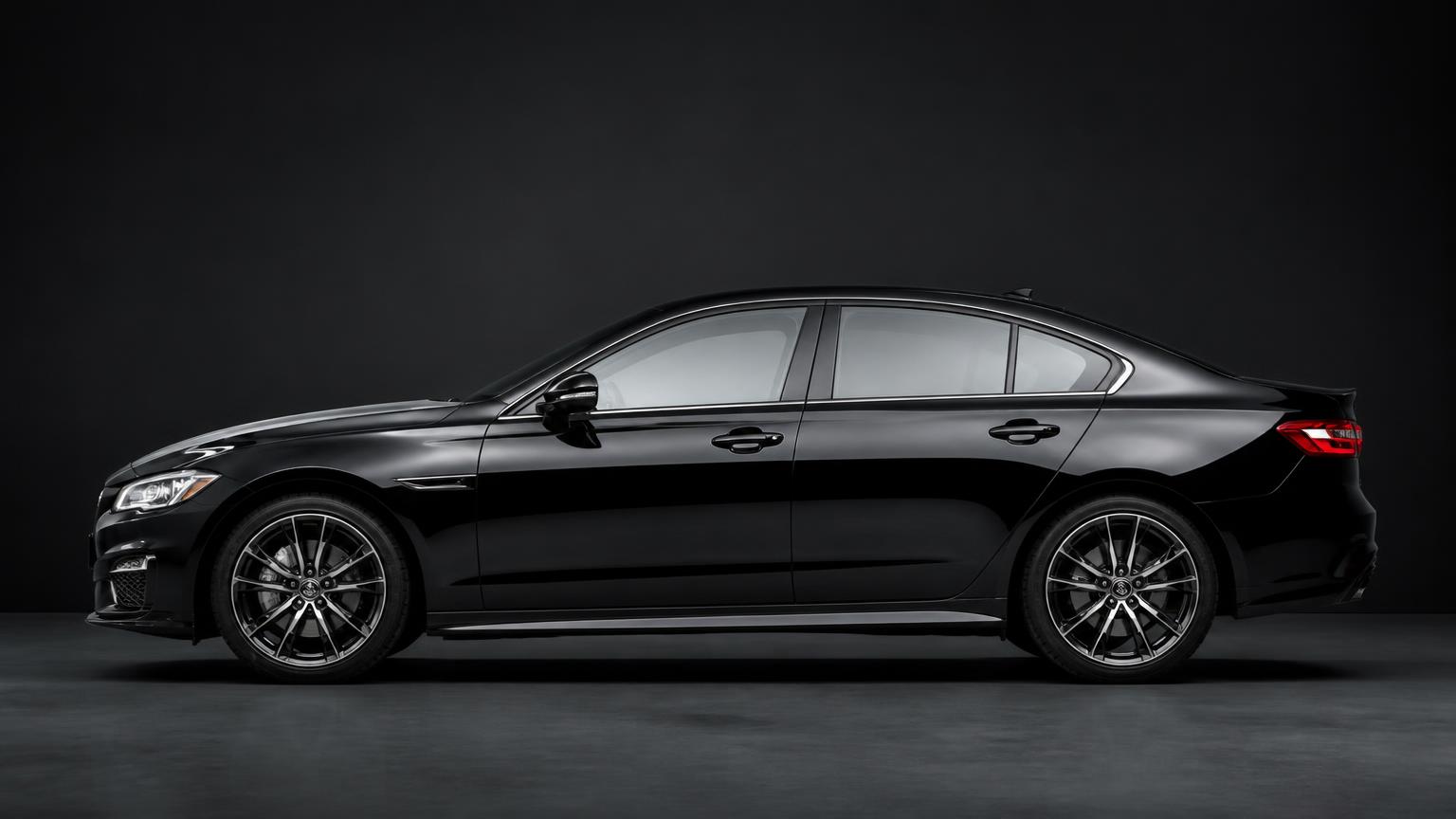 Freshly detailed glossy black sedan after a full Daybreak detail